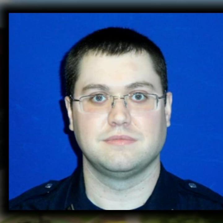 Louisville jail officer charged with assaulting man who worked PGA Championship